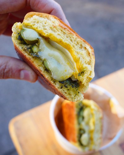 finca-veg-cubano-mojo-asparagus-watercress-pesto-house-pickle-mustard-and-of-course-hot-melted-gouda-all-between-one-lucky-toasted-roll.jpg